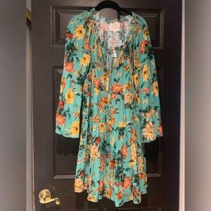 Johnny Was Silk dress, in a beautiful flowery print. Tiered dress and sleeves.